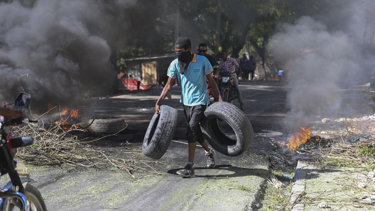 n raison des violences des gangs, MSF suspend ses activités en Haïti. [Keystone - Odelyn Joseph]