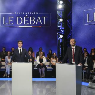 Un débat a réuni les trois forces politiques à cinq jours du 1e tour des élections législatives en France. [Keystone/Pool via AP - Dimitar Dilkoff]