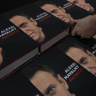 Copies of the late Russian opposition leader Alexei Navalny's memoir entitled 'Patriot' are put display on the first day of sale in a bookshop in London, Tuesday, Oct. 22, 2024. [AP Photo/Keystone - Alastair Grant]