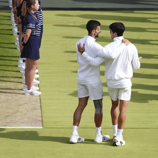 Les joueurs de tennis Novak Djokovic et Carlos Alcaraz. [PA via AP/Keystone - John Walton]