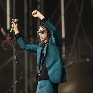 Bobby Gillespie du groupe Primal Scream, lors d'un concert en 2023 à Milan. [AFP - Roberto Finizio]