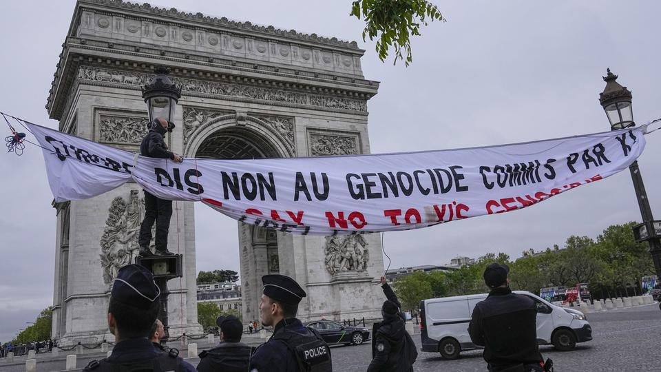 Manifestations à Paris en marge de la visite du président chinois. [KEYSTONE - MICHEL EULER]