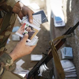 Beaucoup de soldats de l'armée nationale syrienne avaient été recrutés de force pour assurer la sécurité du régime d'el-Assad. [Keystone/EPA - Antonio Pedro Santos]