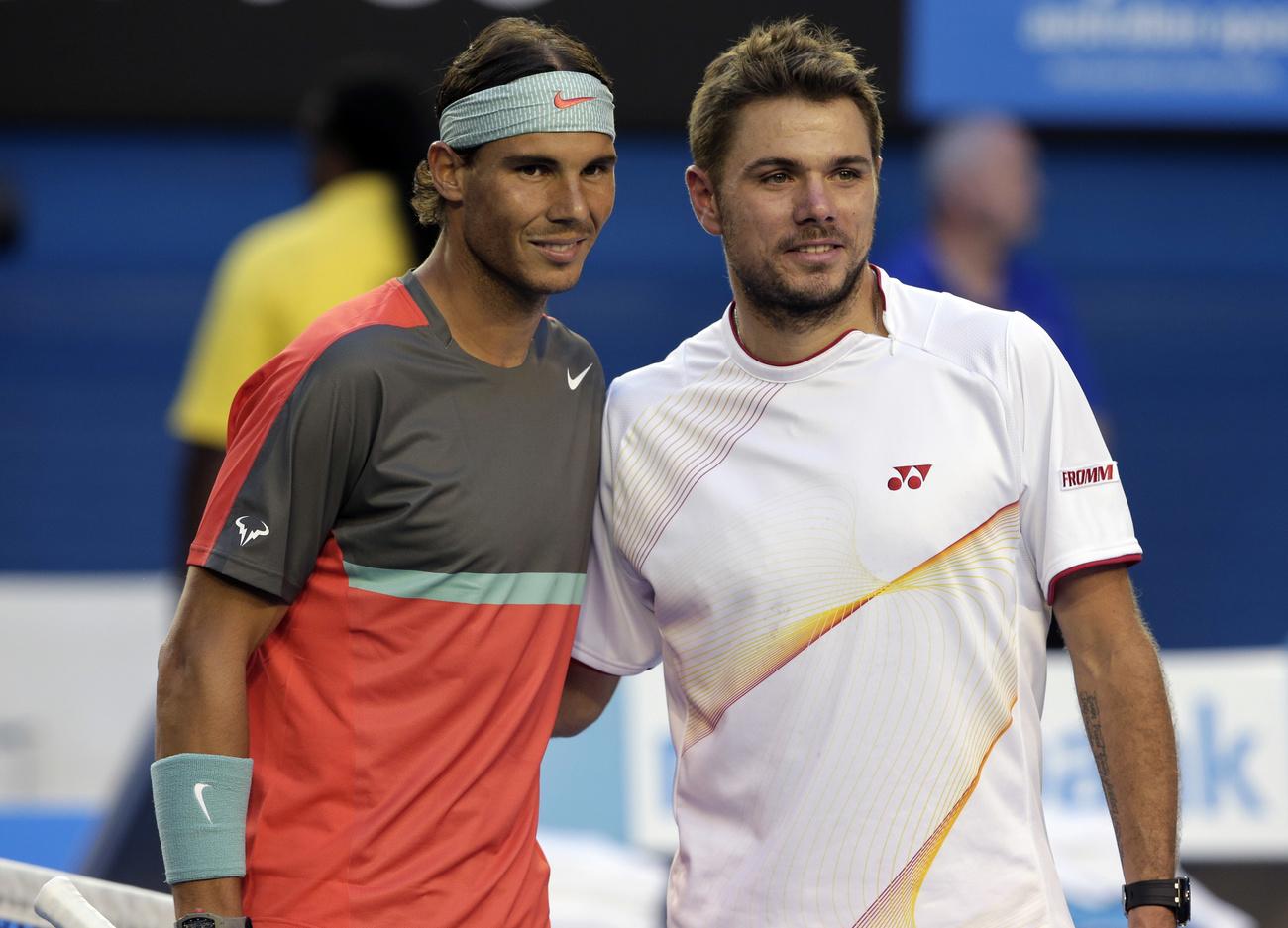 Rafael Nadal et Stan Wawrinka prennent la pose avant de croiser le fer en finale de cet Open d'Australie 2014. [AP - Rick Rycroft]