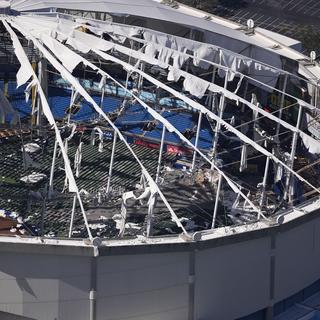 The destroyed roof of the Tropicana Dome is seen in the aftermath of Hurricane Milton, Thursday, Oct. 10, 2024, in St. Petersburg, Fla. [AP Photo/Keystone - Gerald Herbert]