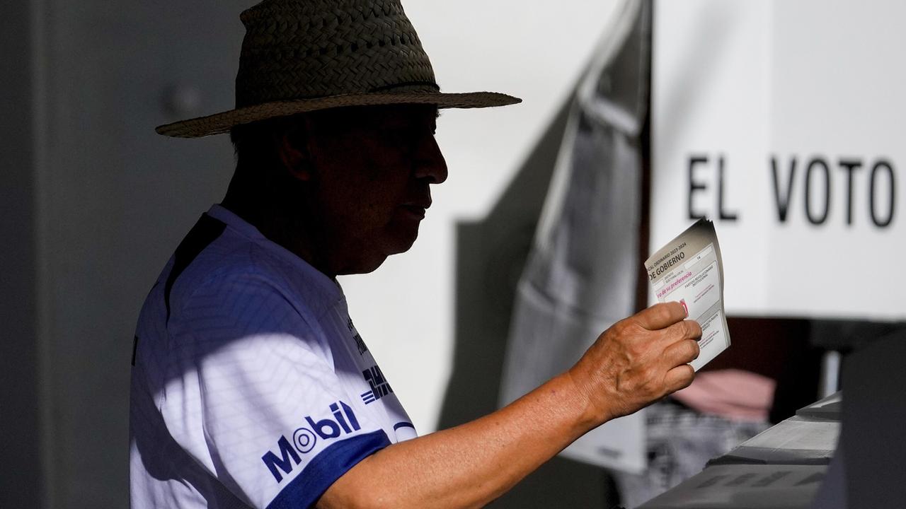 Les Mexicaines et les Mexicains votent dans un climat tendu, pour une élection historique. [Keystone - Matias Delacroix]