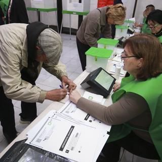 Les bureaux de vote ont ouvert samedi à 8H00 en Géorgie. [AP Photo/keystone - Zurab Tsertsvadze]