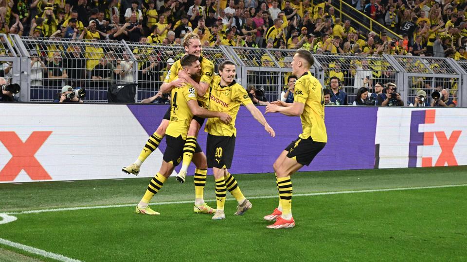 La joie des joueurs du Borussia Dortmund après l'ouverture du score. [Federico Pestellini - Imago]