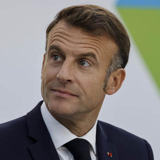 Macron appelle à suspendre les livraisons d'armes à Israël et à privilégier une solution politique. [Pool via AP /KEYSTONE - Ludovic Marin]