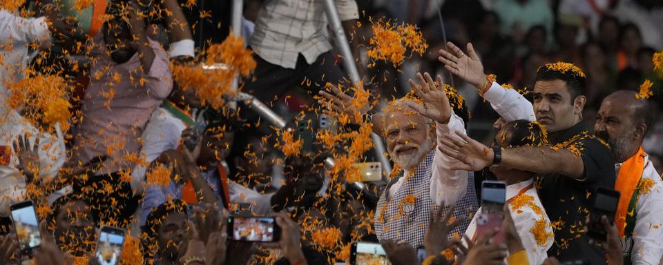 Le parti du Premier ministre Narendra Modi, le Bharatiya Janata Party, est le favori des élections législatives. [KEYSTONE - MAHESH KUMAR A.]