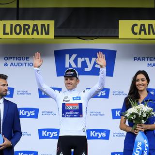 Le belge Remco Evenepoel sur le podium de la 11ème étape du Tour de France [EPA/Keystone - GUILLAUME HORCAJUELO]