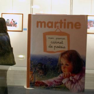 Des dessins de Marcel Marlier représentant son héroïne, Martine, exposés en 2003 au 20e Festival de bande dessinée BD Bloom de Blois, en France. [AFP - ALAIN JOCARD]