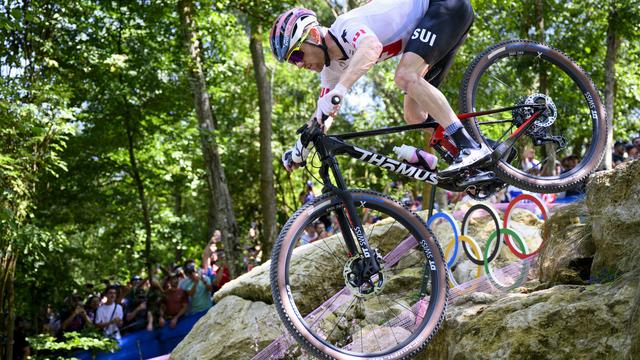 Mathias Flueckier durant le Cross-country des JO de Paris, le 29 juillet 2024. [Keystone - Laurent Gillieron]