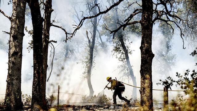 Les incendies se répandent en Californie touchée par une vague de chaleur. [Keystone - AP Photo/Noah Berger]