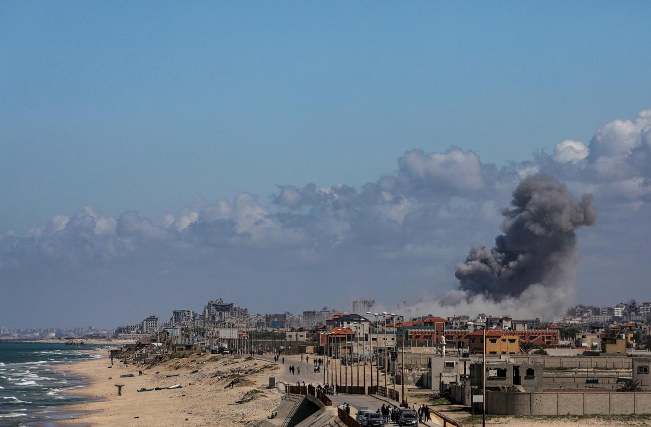 Une frappe israélienne sur la bande de Gaza, le 15 mars 2024. [KEYSTONE - MOHAMMED SABER]