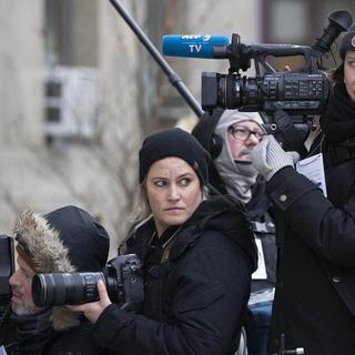 Des photographes de l'Agence France-Presse (AFP). [Keystone - AP Photo/Mary Altaffer)]