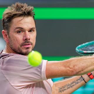 Stan Wawrinka of Switzerland in action during his Men's Singles first round match against Giovanni Mpetshi Perricard of France at the Shanghai Masters tennis tournament in Shanghai, China, 03 October 2024. [EPA/Keystone - ALEX PLAVEVSKI]