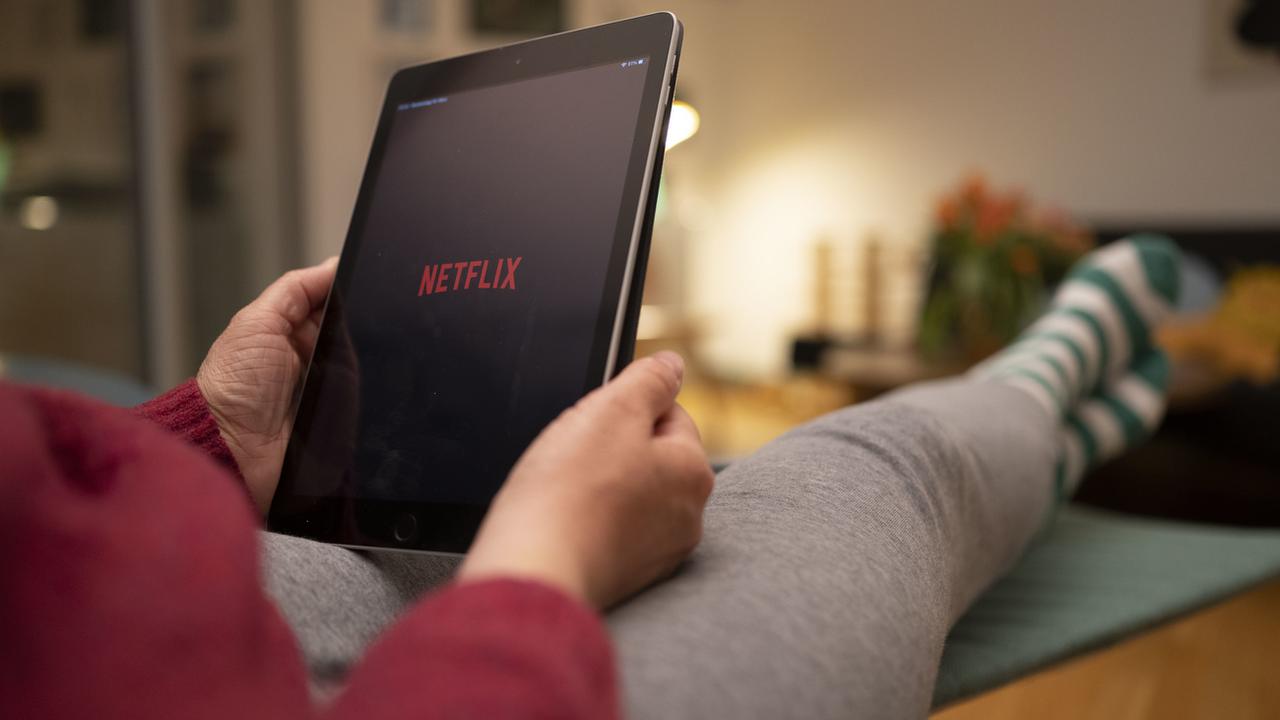 Netflix continue à gagner des millions d'abonnés. [Keystone - Christian Beutler]