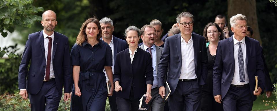 Les leaders du NFP après la rencontre avec Emmanuel Macron. De gauche à droite Manuel Bompard (LFI), Marine Tondelier (EELV), Lucie Castets, Olivier Faure (PS) et Fabien Roussel (PCF). [EPA/KEYSTONE - Teresa Suarez]