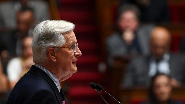 Michel Barnier devant l'Assemblée nationale. [Keystone - EPA/JULIEN MATTIA]