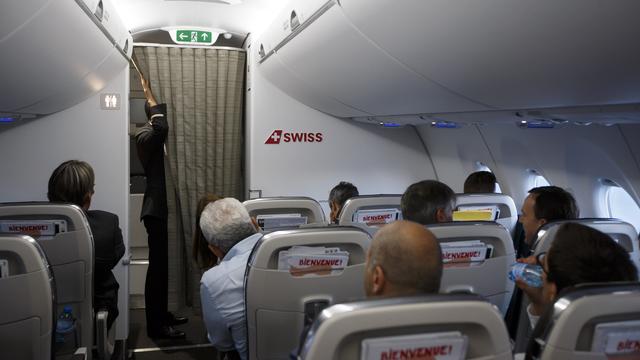 Photo d'archives à l'intérieur d'un avion de Swiss. [Keystone - Salvatore Di Nolfi]