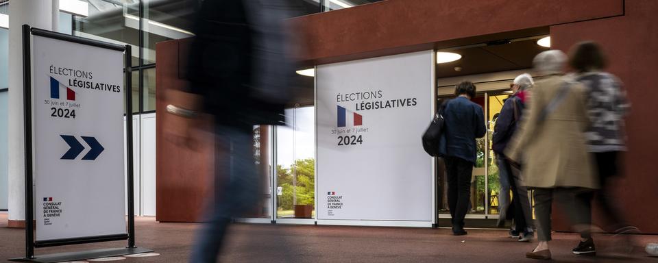 L'entrée des bureaux de vote à Palexpo. [Keystone - Martial Trezzini]