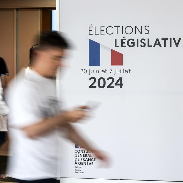 Attente des résultats pour les législatives en France. [Keystone - Martial Trezzini]