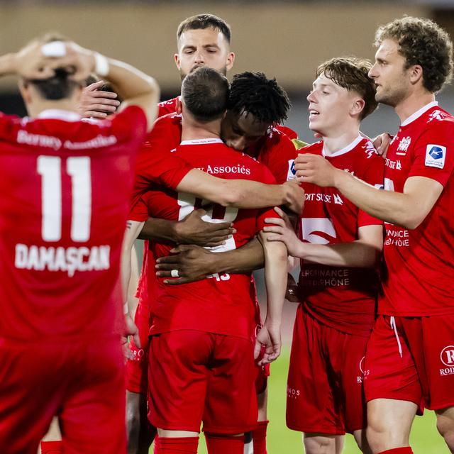 Les joueurs du Stade Lausanne Ouchy. [Keystone - Jean-Christophe Bott]