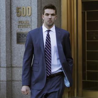 Billy McFarland, the promoter of the failed Fyre Festival in the Bahamas, leaves federal court after pleading guilty to wire fraud charges, Tuesday, March 6, 2018, in New York. He faces a sentence of 8 to 10 years. [AP Photo/Keystone - Mark Lennihan]