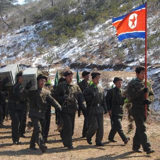 Une troupe de soldats de l'armée nord-coréenne en plein exercice, en 2013. [EPA/KEYSTONE - KCNA (photo d'Etat)]