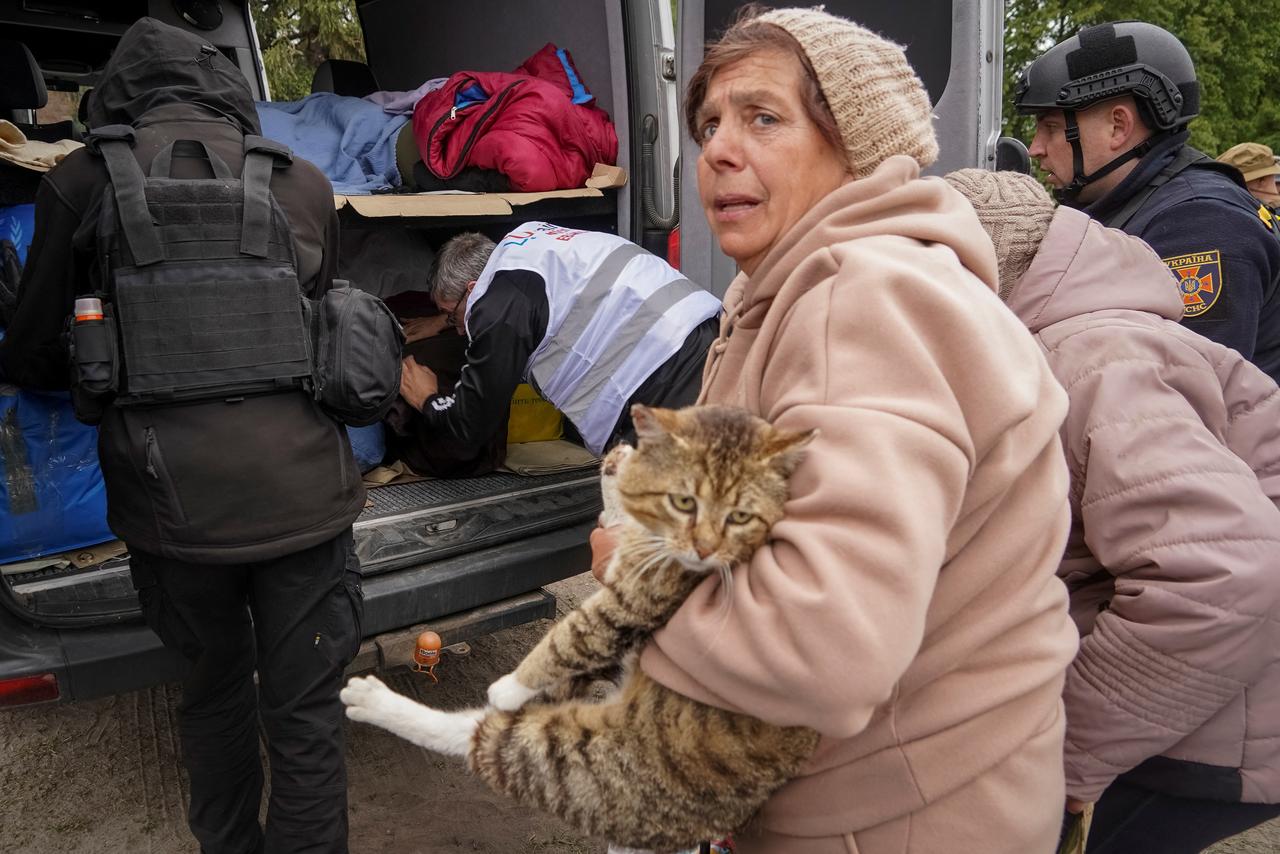 On May 13, 2024, local residents evacuated to Kharkiv due to Russian shelling near the city of Vovsansk, Kharkiv province.  In total, at least 6,000 residents had to be evacuated over the past few days. [REUTERS - Stringer]