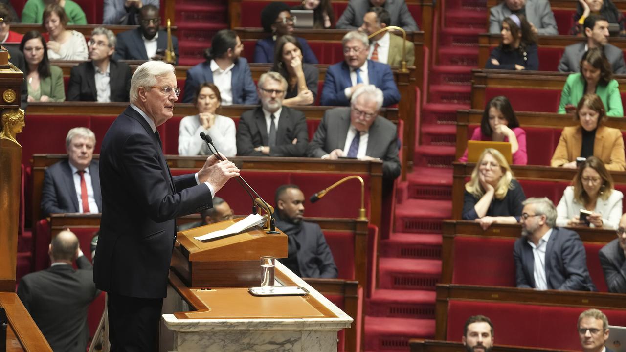 Michel Barnier devant l'Assemblée Nationale, le 2 décembre 2024. [Keystone - AP Photo/Michel Euler]