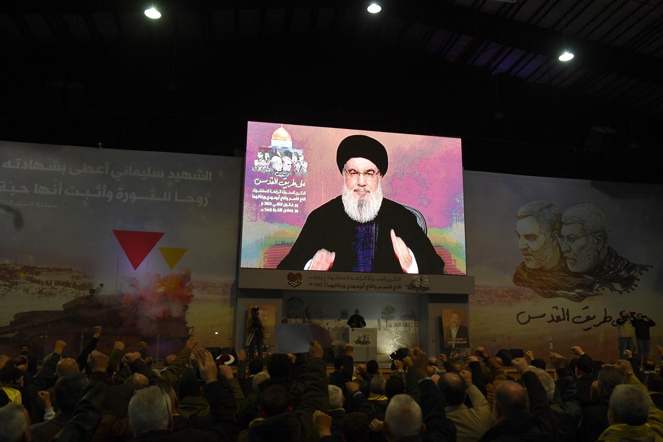 Le secrétaire général du Hezbollah Hasan Nasrallah, lors d'un discours télévisé le 3 janvier 2024. [Keystone - Abbas Salman]