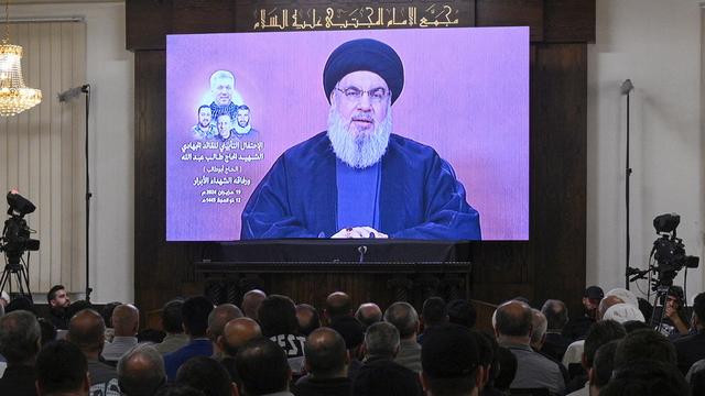 Le chef du Hezbollah libanais Hassan Nasrallah lors d'un discours télévisé. [KEYSTONE - WAEL HAMZEH]