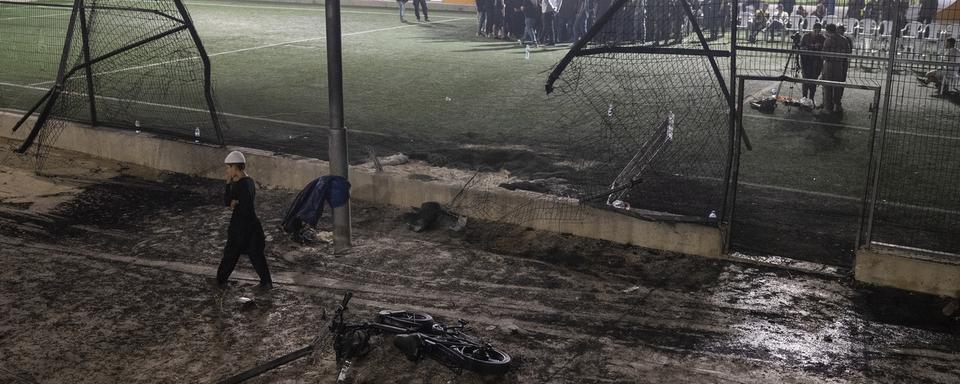 Le terrain de foot où des enfants ont été tués par un tir de roquette dans le Golan. [AP Photo/Keystone - Leo Correa]