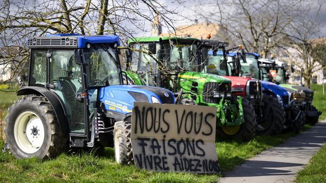 Action "Feu de protestation pour l'agriculture" du groupe "Révolte agricole Suisse", samedi 24 février 2024 à Lussy-sur-Morges. [KEYSTONE - LAURENT GILLIERON]