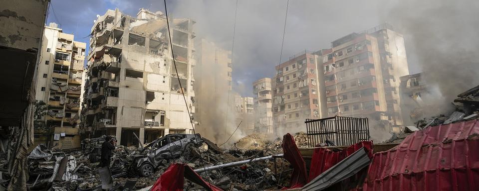 Smoke rises from the site of an Israeli airstrike in Beirut's southern suburb, Lebanon, Tuesday, Oct. 1, 2024. [AP Photo/Keystone - Hassan Ammar]