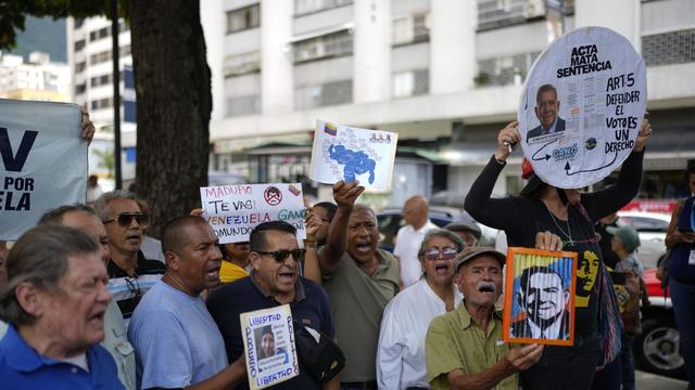 Une manifestation en soutien aux prisonniers politiques incarcérés par le président Nicolas Maduro et contre ce dernier à Caracas au Vénézuela, le 28 septembre 2024. [Keystone - AP Photo/Ariana Cubillos]