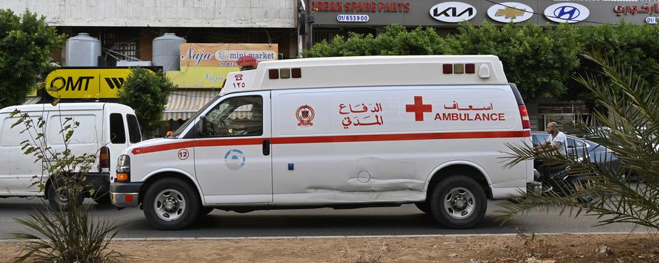 epa11610088 An ambulance moves along the road after an incident involving Hezbollah members' wireless devices in Beirut, Lebanon, 17 September 2024. According to the Lebanese Health minister, at least eight people died and more than 2.500 were injured. 'Several wireless communication devices (pagers) were detonated using advanced technologyâÄ&#x2122;, the state news agency said. EPA/WAEL HAMZEH [Keystone/EPA - Wael Hamzeh]