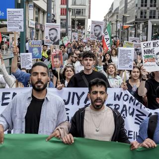 Manifestation à Berlin le 28 avril 2024 pour protester contre la condamnation à mort prononcée par l'Iran envers le rappeur Toomaj Salehi. [AP/Keystone - Ebrahim Noroozi]