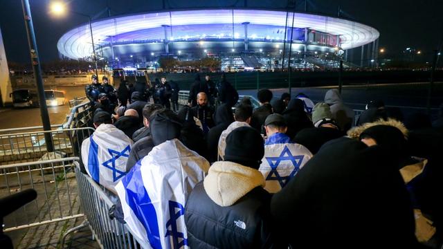 Supporters with Israeli flags queue outside the Stade de France stadium ahead of the UEFA Nations League League A, Group A2 football match between France and Israel in Saint-Denis, France, on November 14, 2024. The French team hosts Israel in a very tense atmosphere on November 14, 2024, at the Stade de France, where an exceptional security presence is in place amidst the conflict in the Middle East, with tensions exacerbated by last week's violence on the sidelines of a Maccabi Tel-Aviv match in Amsterdam. (Photo by Michel Stoupak/NurPhoto)
Michel Stoupak / NurPhoto / NurPhoto via AFP [NurPhoto via AFP - Michel Stoupak]