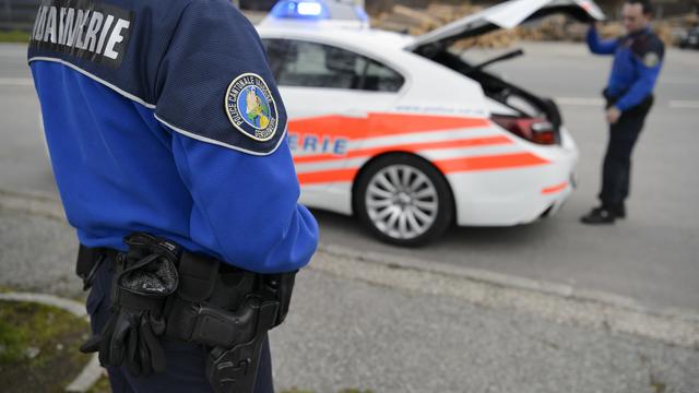 Un véhicule de la police vaudoise. [KEYSTONE - LAURENT GILLIERON]