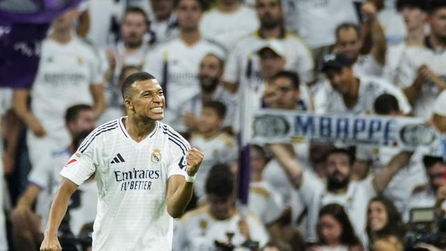 Kylian Mbappé exulte après avoir inscrit ses premiers buts en Liga. [KEYSTONE - BORJA SANCHEZ-TRILLO]