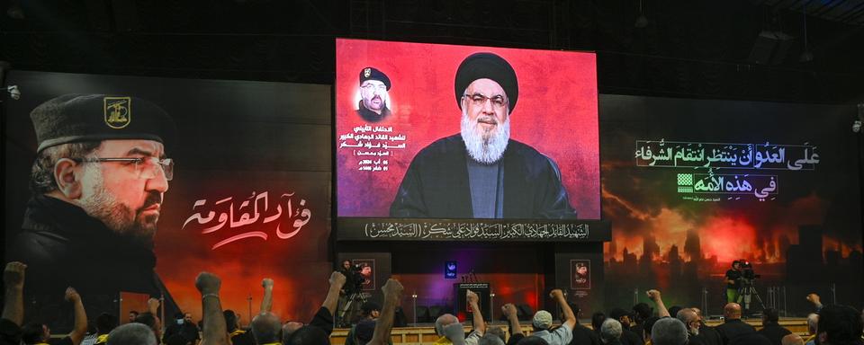 Le chef du Hezbollah Hassan Nasrallah reste ambigu sur les hostilités à venir. [Keystone. - WAEL HAMZEH / EPA]