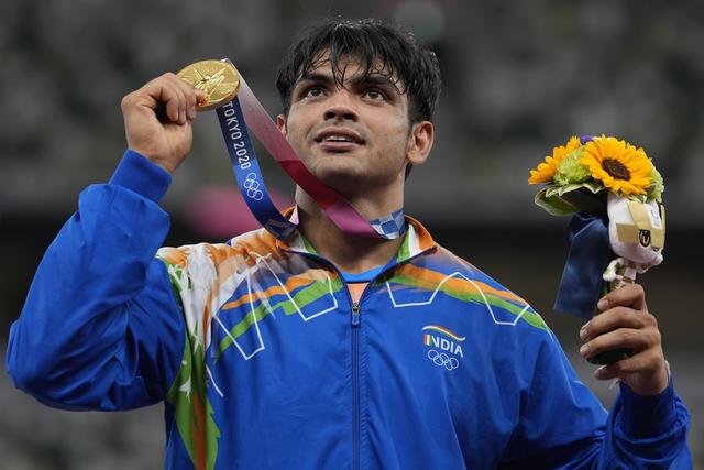 Champion olympique en javelot à Tokyo, l'Indien Neeraj Chopra. [KEYSTONE - MARTIN MEISSNER]