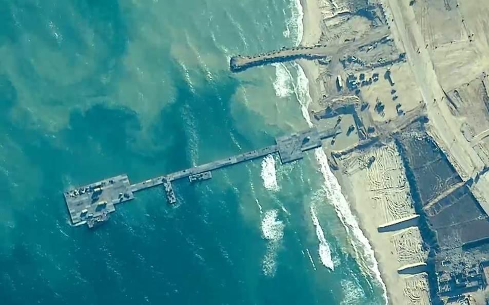 Une image du port temporaire construit par les Etats-Unis pour permettre l'entrée à Gaza d'aide humanitaire. [KEYSTONE - US CENTRAL COMMAND HANDOUT]