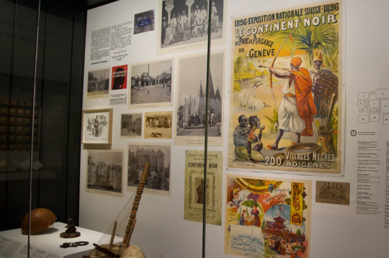 Affiche de l’Exposition nationale suisse de 1896 annonçant le «Village noir». [SWI swissinfo.ch - Paula Dupraz-Dobias]