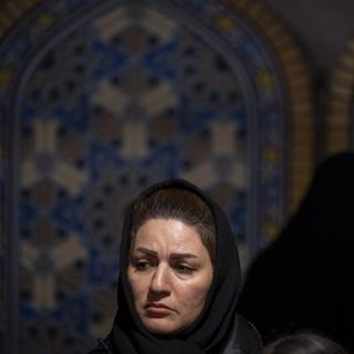 Une Iranienne dans le nord de Téhéran, en Iran, le 4 décembre 2024. [AFP - Morteza Nikoubazl]