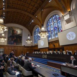 Les juges de la Cour internationale de justice à la Haye le 2 décembre 2024. [Keystone]