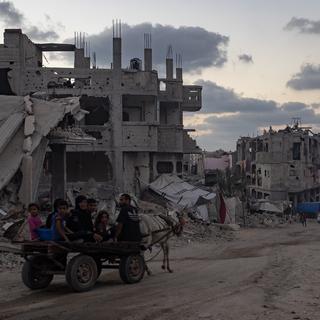 Les conséquences à Gaza, après un an de bombardements. [Keystone - EPA/Haitham Imad]